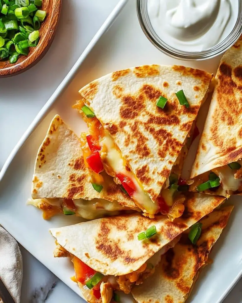 Chicken and Cheese Quesadillas with Peppers, Onions, and Avocado Recipe