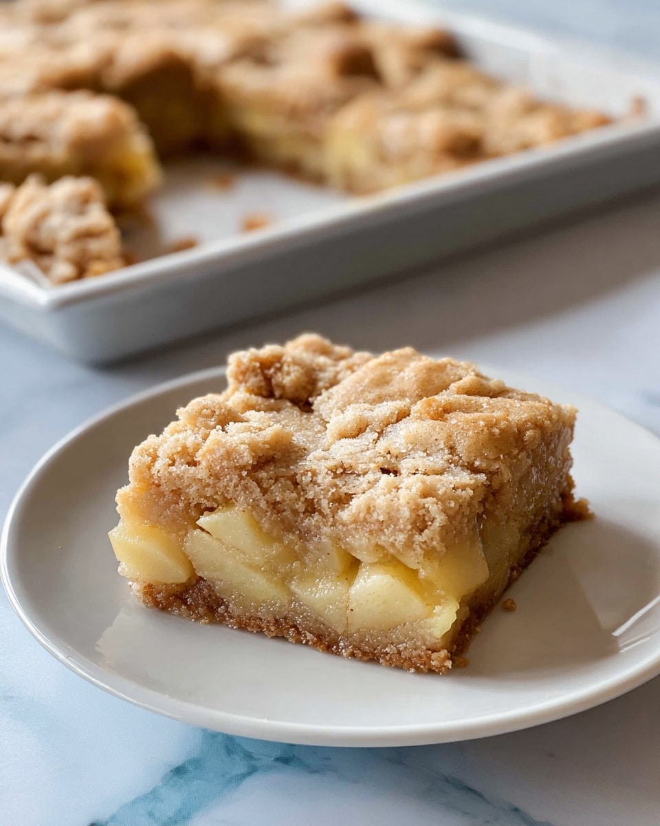 A rectangular white baking tray lined with parchment paper holds a single-layer brown batter that covers the entire surface with an uneven texture. Light cream-colored chunks are scattered throughout the batter, creating soft patches of contrast. A light dusting of white granulated sugar is sprinkled broadly across the top. The tray sits on a white marbled surface. Photo taken with an iphone --ar 4:5 --v 7