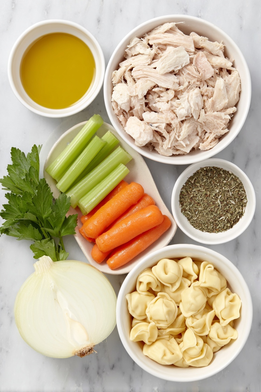 Flat lay of a small white ceramic bowl of golden olive oil, a halved medium yellow onion with layers visible, three bright green celery stalks trimmed and chopped, three vibrant orange carrots peeled and sliced, two peeled garlic cloves, a small white bowl filled with mixed dried Italian herbs, a white ceramic bowl holding light brown shredded cooked chicken, a handful of fresh flat-leaf parsley sprigs, a few uncooked cheese tortellini pasta pieces with folded ring shapes, and a white ceramic bowl filled with golden chicken broth, arranged with perfect symmetry and realistic proportions, placed on a clean white marble surface, soft natural light, photo taken with an iPhone, professional food photography style, fresh ingredients, white ceramic bowls, no bottles, no duplicates, no utensils, no packaging --ar 2:3 --v 7 --p m7354615311229779997 - Chicken Tortellini Soup, easy chicken tortellini soup, cheesy tortellini soup, comforting chicken soup recipe, quick weeknight soup