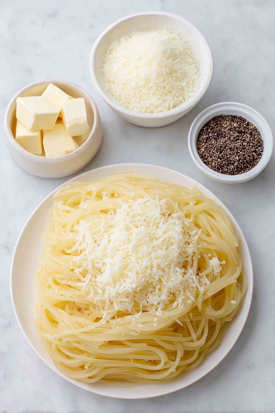 Flat lay of dried bucatini pasta nest, two tablespoons of unsalted butter in a small white ceramic bowl, half cup of freshly grated Pecorino Romano cheese in a simple white plate, cracked black peppercorns scattered neatly beside a small white bowl containing toasted cracked black pepper, placed on a clean white marble surface, soft natural light, photo taken with an iPhone, professional food photography style, fresh ingredients, white ceramic bowls, no bottles, no duplicates, no utensils, no packaging --ar 2:3 --v 7 --p m7354615311229779997 - Cacio e Pepe Pasta, Italian pasta dishes, simple pasta recipes, creamy pepper pasta, quick Roman pasta dishes