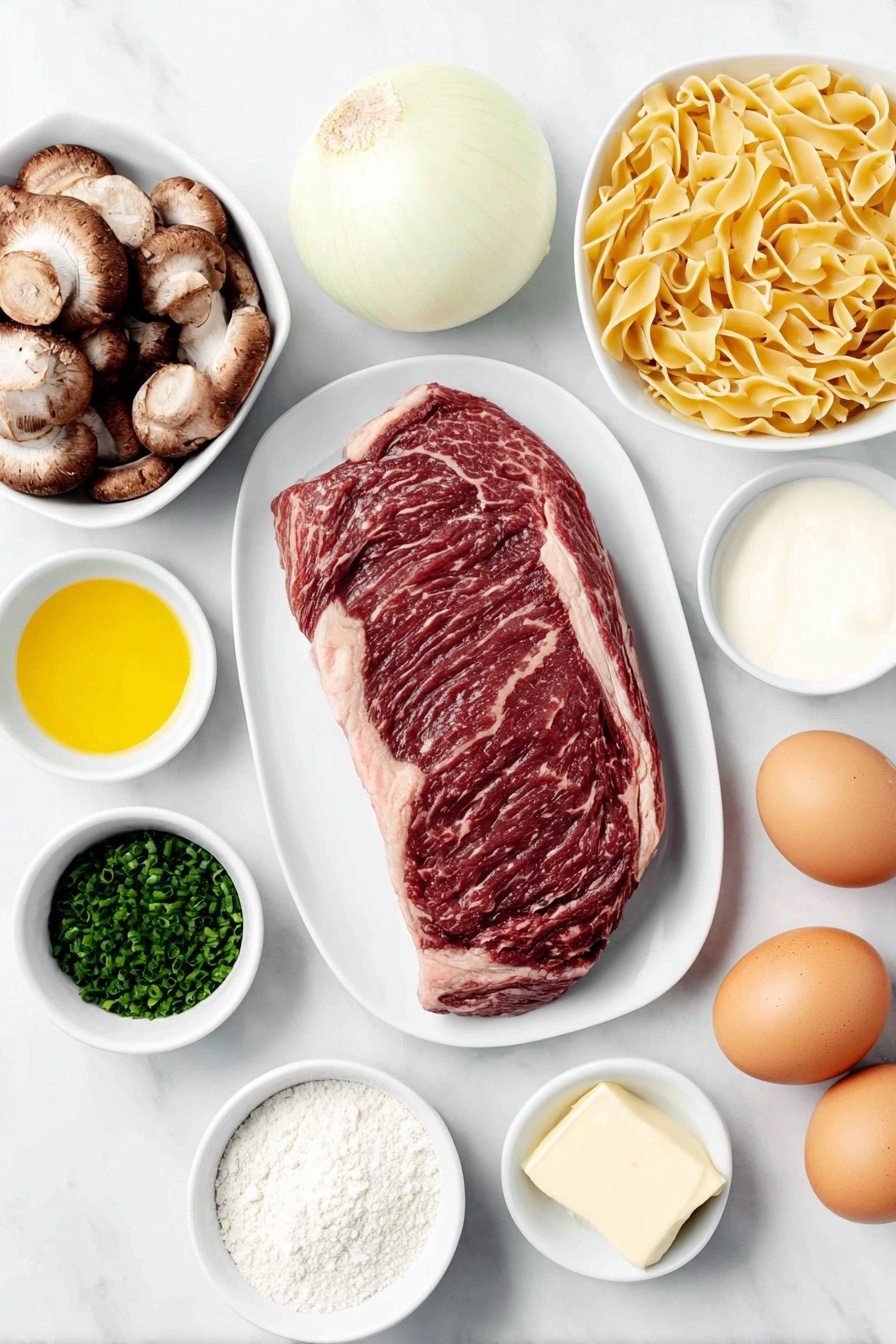 Flat lay of a fresh whole boneless rib eye steak, a large sliced yellow onion, a small pile of thick-sliced brown mushrooms, a few pats of golden butter on a white ceramic plate, a small mound of plain white flour on a white ceramic dish, a small white bowl filled with rich beef broth, a small white bowl of smooth sour cream, a small white bowl containing golden vegetable oil, a small white bowl with bright yellow Dijon mustard, two whole brown eggs with uncracked clean shells, a portion of uncooked short egg noodles neatly arranged, and a small pile of finely chopped fresh green chives, all arranged in perfect symmetry on a simple white ceramic surface, placed on a clean white marble surface, soft natural light, photo taken with an iPhone, professional food photography style, fresh ingredients, white ceramic bowls, no bottles, no duplicates, no utensils, no packaging --ar 2:3 --v 7 --p m7354615311229779997 - Beef Stroganoff, Beef Stroganoff with Mushrooms, Creamy Beef Stroganoff, Classic Beef Stroganoff, Easy Beef Stroganoff