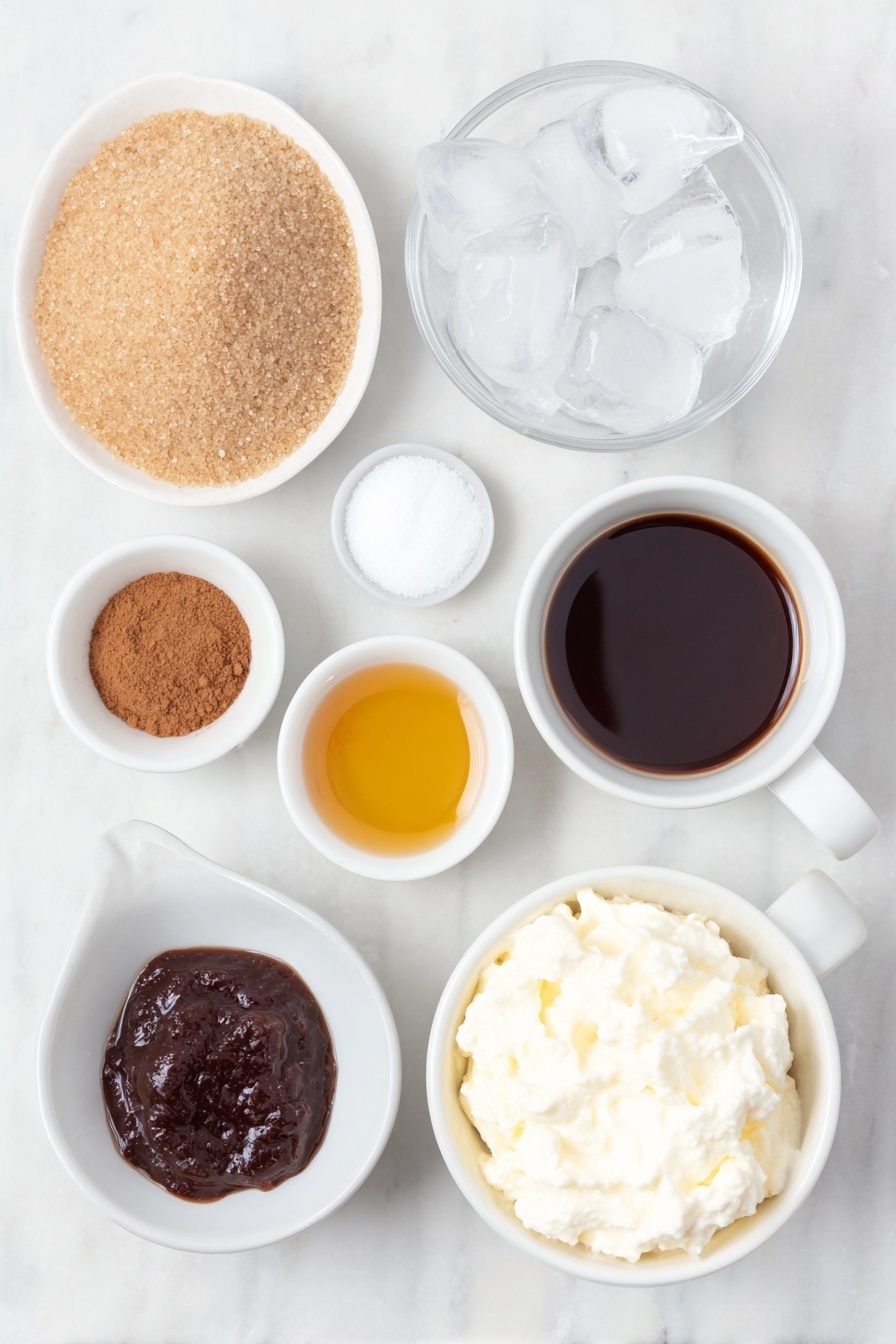Flat lay of a small mound of light brown sugar, a small white ceramic bowl of clear water, a small white ceramic bowl with thick dark molasses, a small white ceramic bowl of ground ginger powder, a small white ceramic bowl of ground cinnamon powder, a small white ceramic bowl of golden vanilla extract, a double shot of freshly brewed espresso in a simple white ceramic cup, a small handful of clear ice cubes, a small white ceramic bowl filled with creamy oat milk, and a small white ceramic bowl of smooth coconut whipped cream dollop, all arranged symmetrically and naturally on a clean white marble surface, soft natural light, photo taken with an iPhone, professional food photography style, fresh ingredients, white ceramic bowls, no bottles, no duplicates, no utensils, no packaging --ar 2:3 --v 7 --p m7354615311229779997 - Gingerbread Latte Coffee, Gingerbread Latte Copycat, Holiday Coffee Drinks, Homemade Gingerbread Latte, Spiced Coffee Recipes