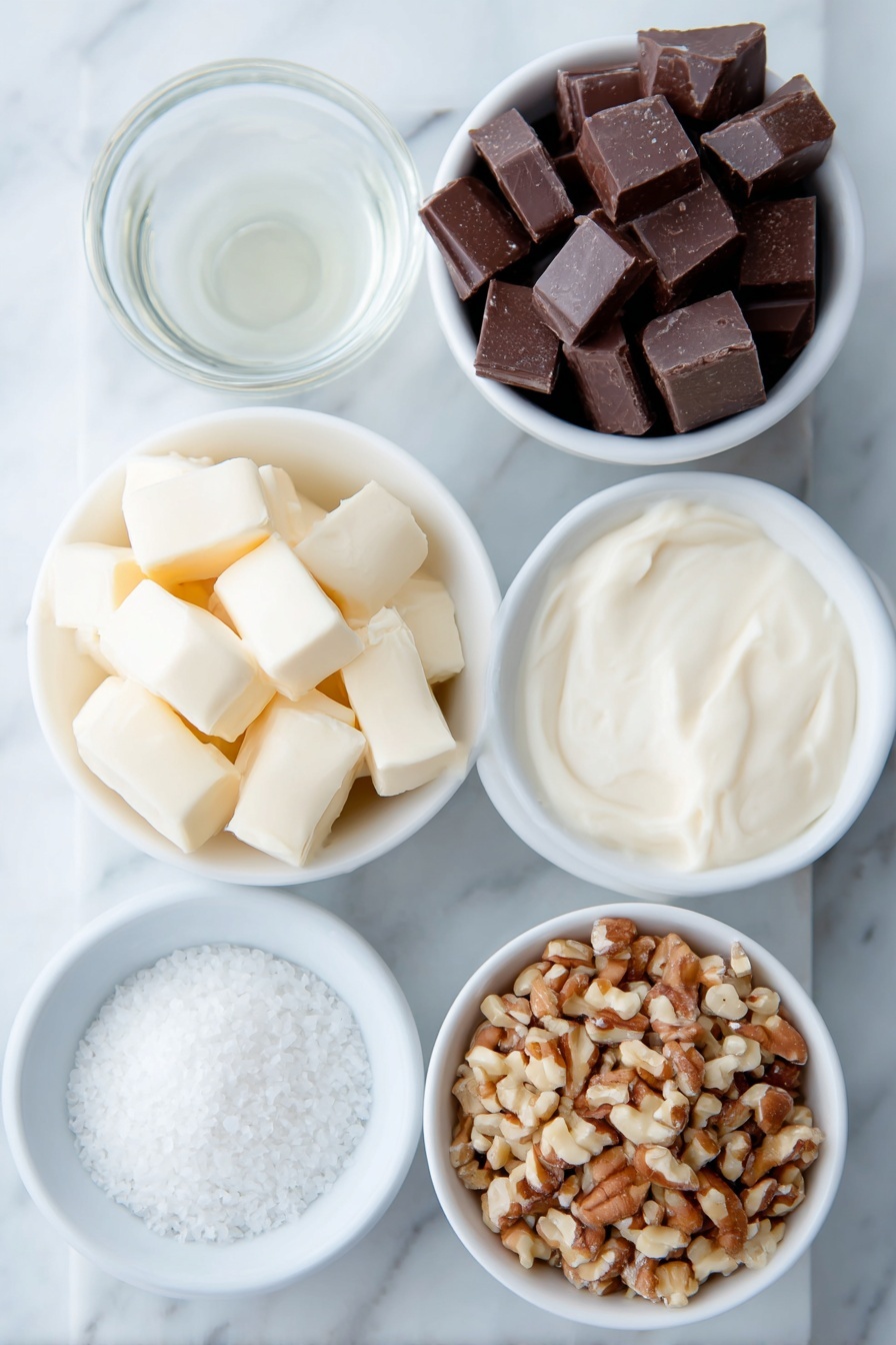 Flat lay of a small white ceramic bowl filled with thick sweetened condensed milk, a few glossy semi-sweet chocolate chunks roughly chopped, several soft pale yellow pieces of unsalted butter at room temperature, a small white ceramic bowl holding clear pure vanilla extract, a small white ceramic bowl with flaky sea salt crystals, and a small white ceramic bowl containing chopped mixed nuts, all arranged symmetrically and balanced, placed on a clean white marble surface, soft natural light, photo taken with an iPhone, professional food photography style, fresh ingredients, white ceramic bowls, no bottles, no duplicates, no utensils, no packaging --ar 2:3 --v 7 --p m7354615311229779997 - Easy Chocolate Fudge, decadent fudge recipe, quick chocolate fudge, homemade fudge recipe, simple fudge dessert